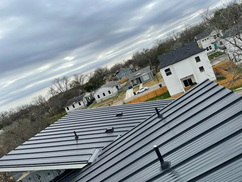Standing seam metal roof panels with vents for Skylight Repair in Baltimore Highlands